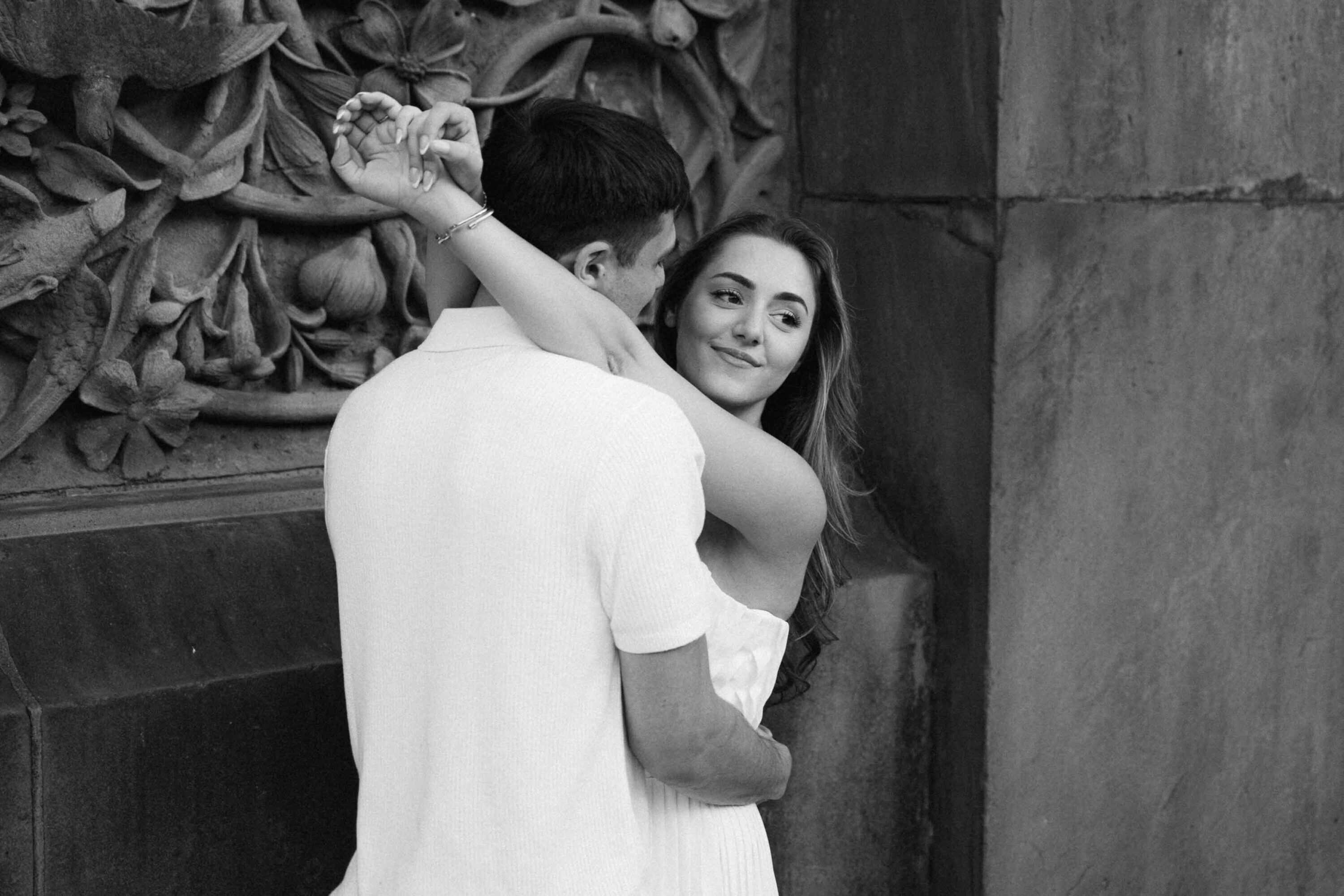 Celena and Cameron embracing during their Central Park engagement photos