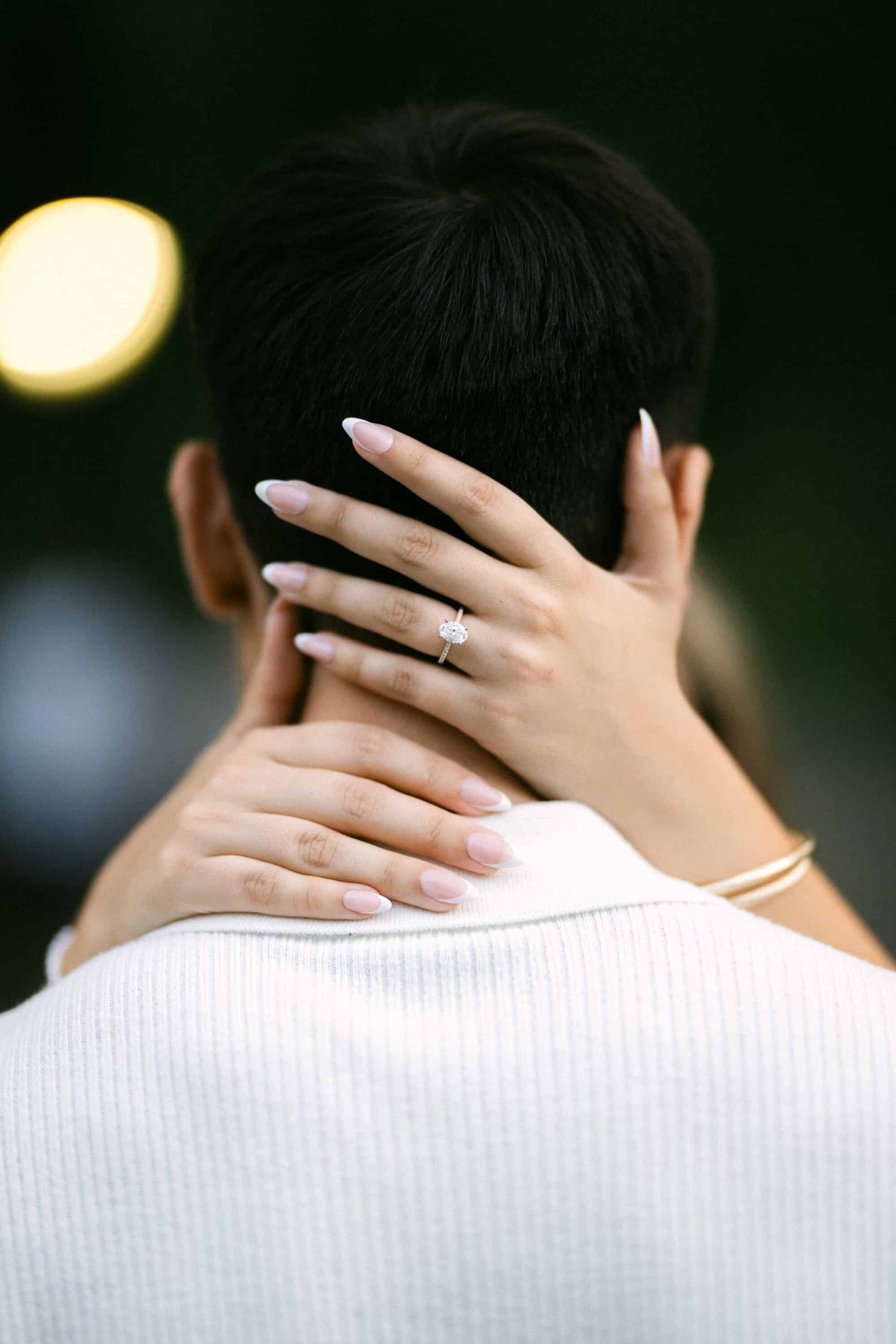 Candid Central Park engagement photos of a couple walking through the park