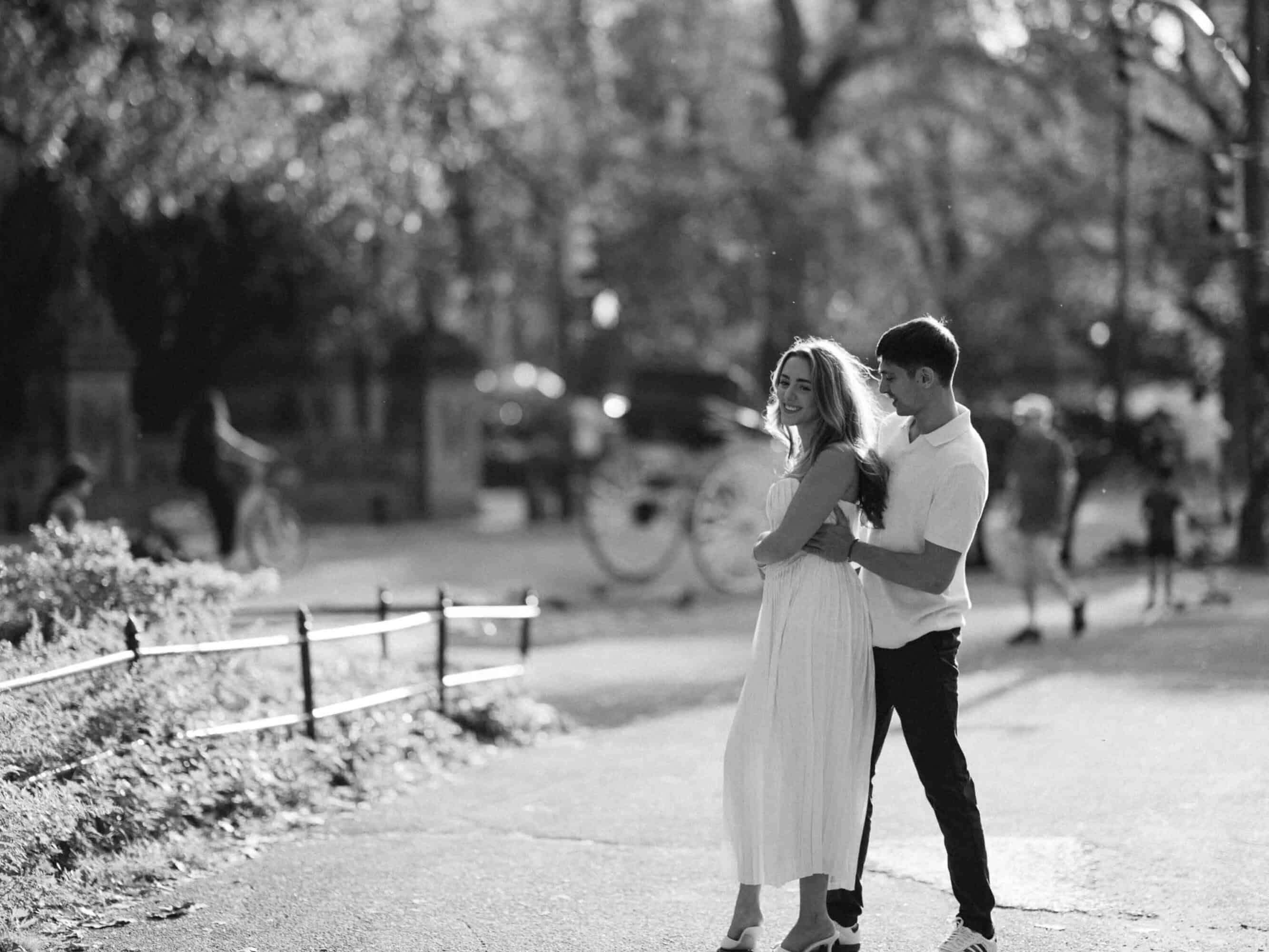 Documentary Central Park engagement session, Celena and Cameron laughing together