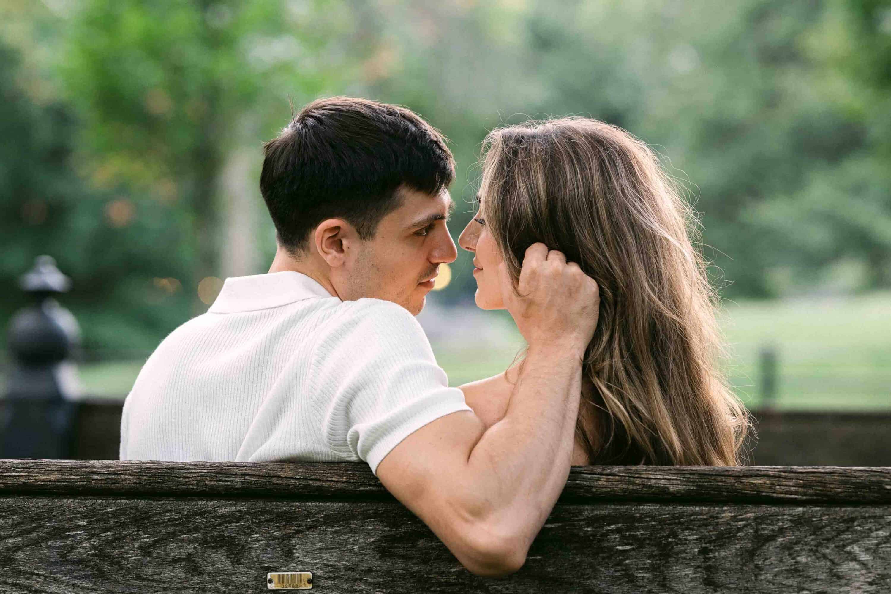 Celena and Cameron embracing during their Central Park engagement photos