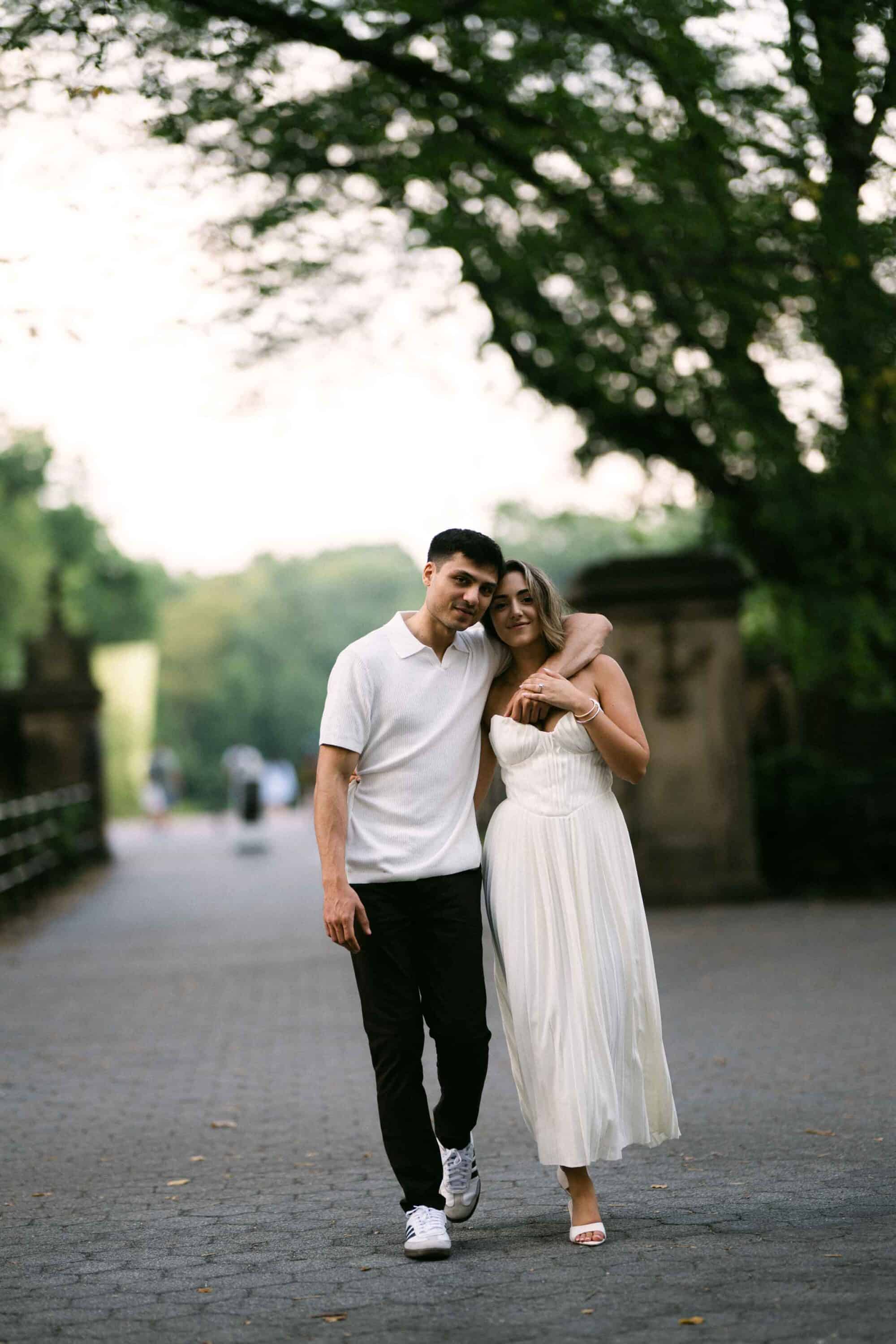 Celena and Cameron sharing a quiet moment during their Central Park engagement session