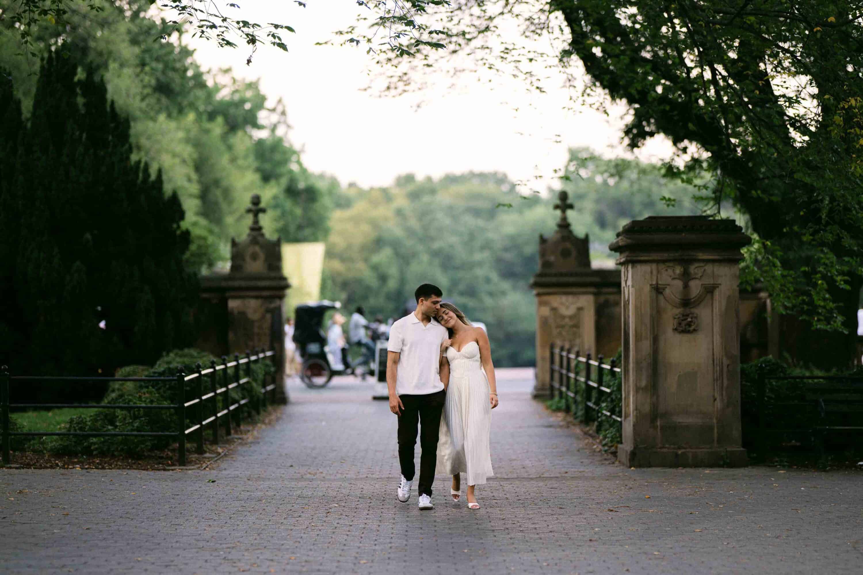 Celena and Cameron embracing during their Central Park engagement photos