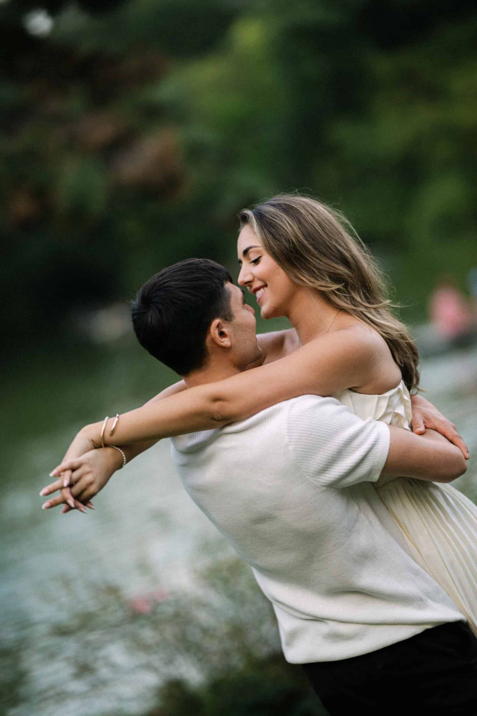 Celena and Cameron embracing during their Central Park engagement photos
