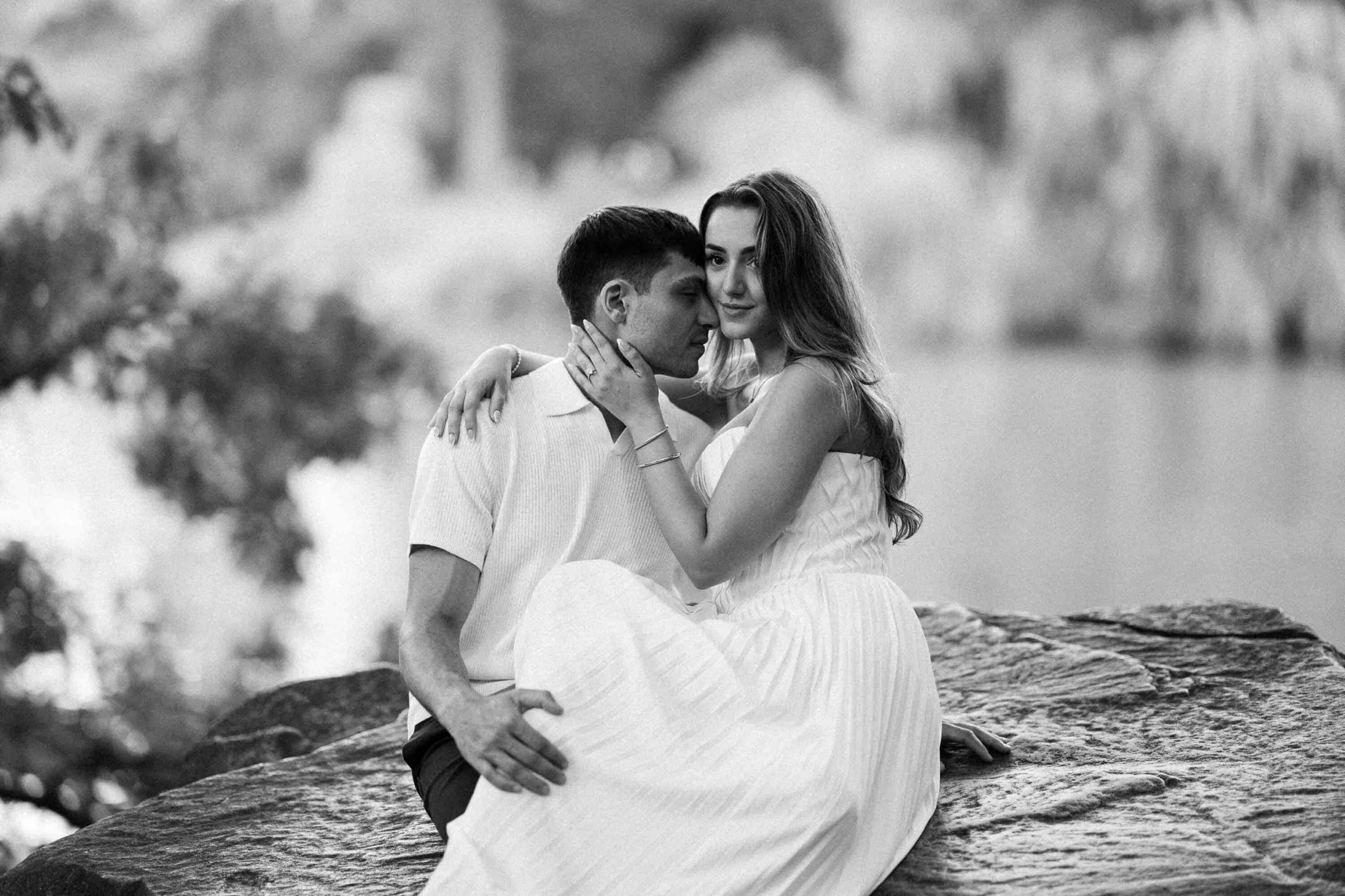 Candid Central Park engagement photos of a couple walking through the park