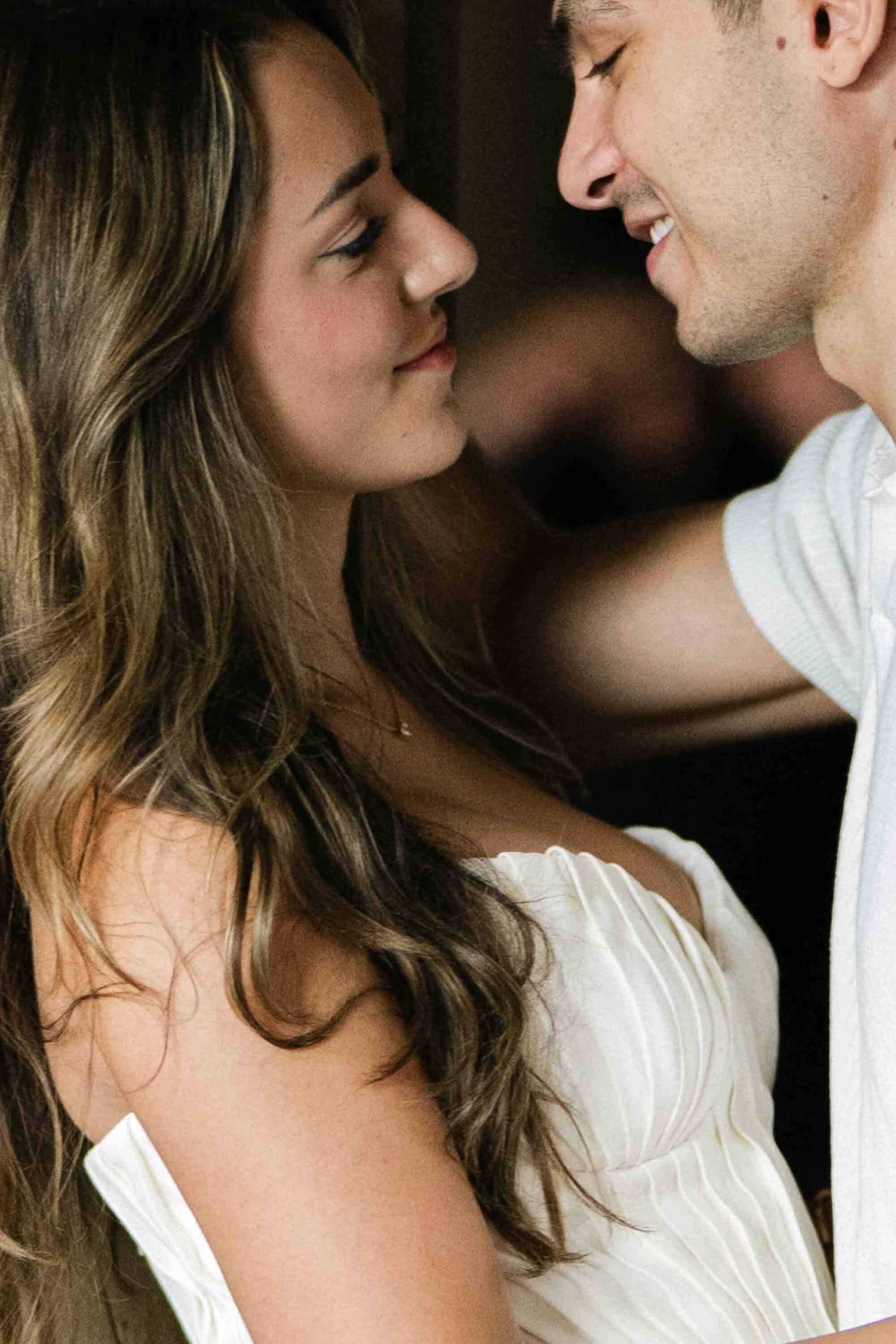 Celena and Cameron embracing during their Central Park engagement photos