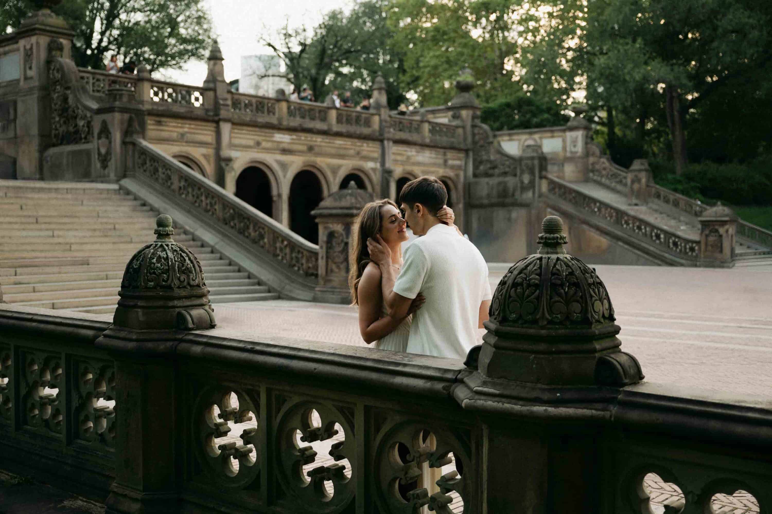 Celena and Cameron embracing during their Central Park engagement photos